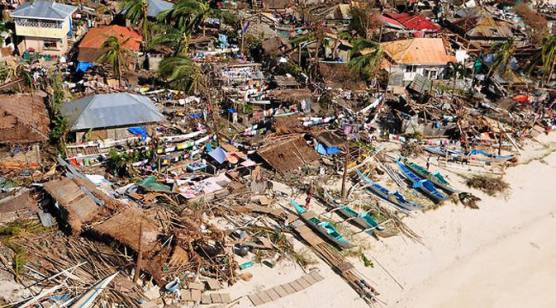 Gambar 1. Rumah-Rumah Banyak Yang Sudah Rata Dengan Tanah Akibat Diterjang Topan Haiyan
